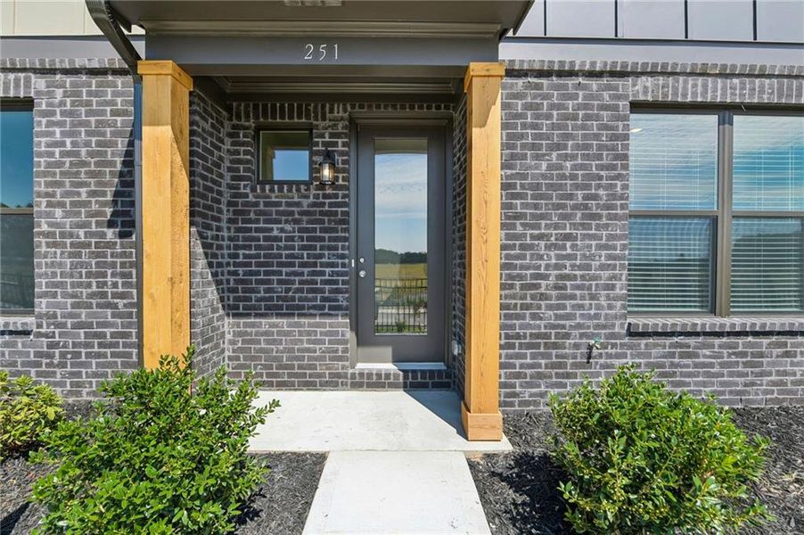 Exterior details and patio area of a home in Tribute, Hoschton (Image 3).