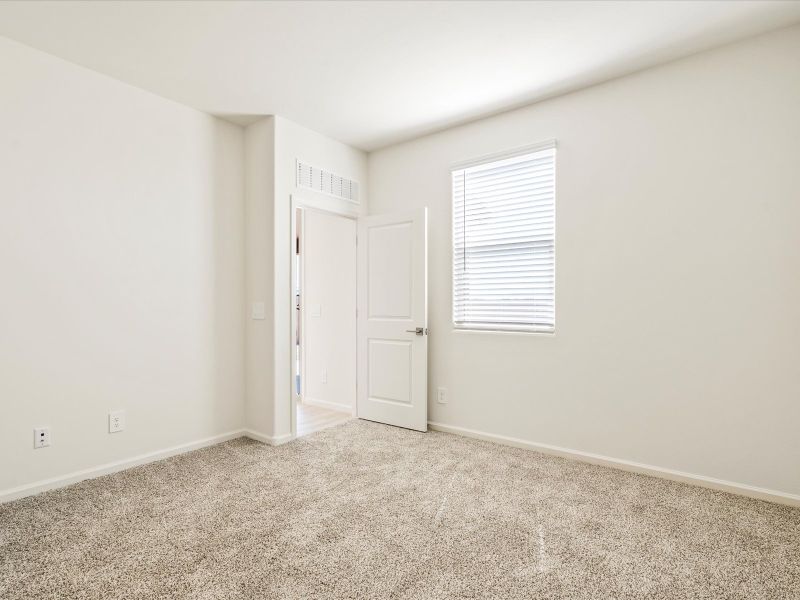 Spacious, unfurnished interior of a new home in Mandarina - Premier Series, Marana (Image 8).
