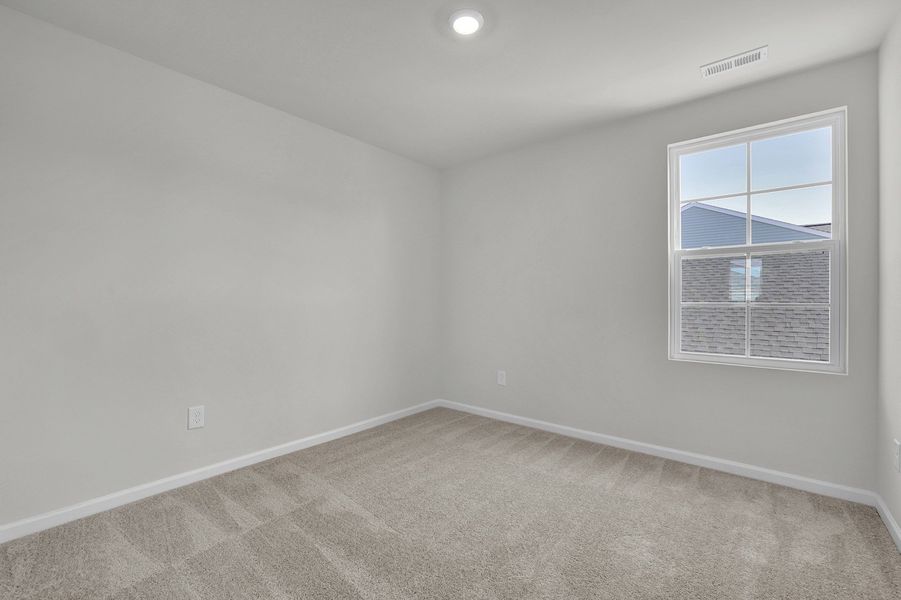 Spacious, unfurnished interior of a new home in River Tide Farms, Bolivia (Image 24).