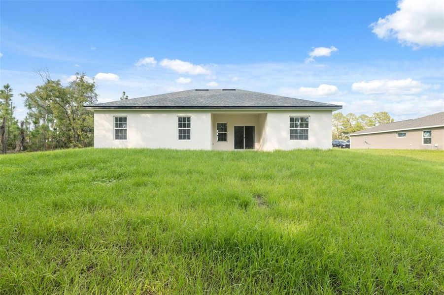 Front exterior of a new home in , Ocala, FL, highlighting curb appeal (Image 17).