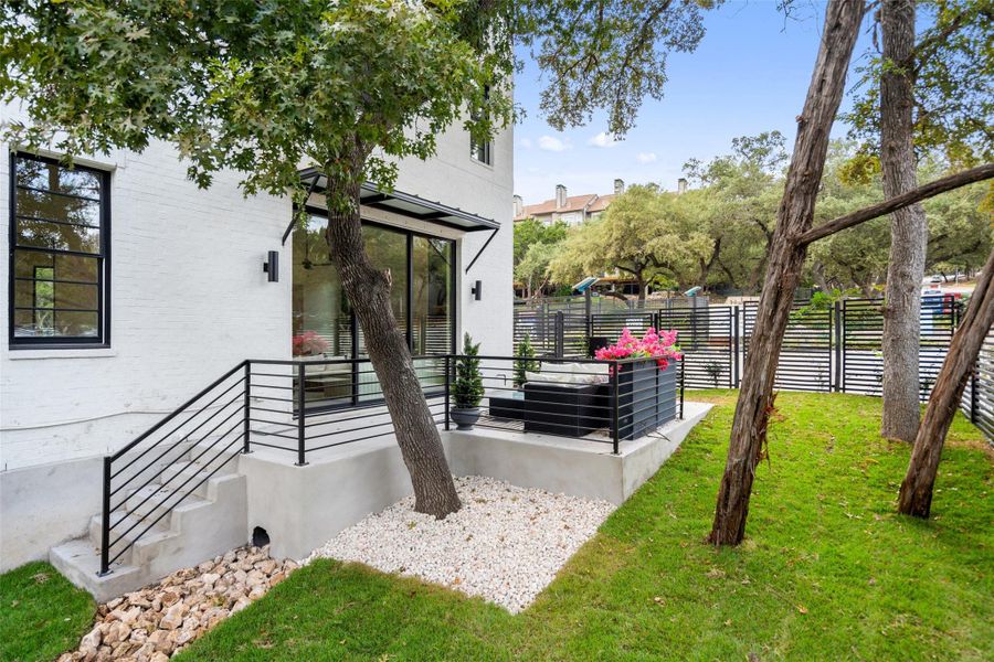 Exterior details and patio area of a home in Spyglass, Austin (Image 22).
