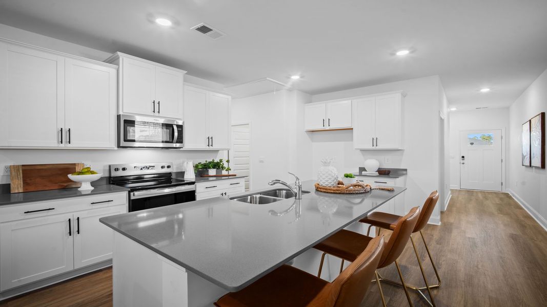 Furnished interior view inside a new home in The Lakes at North Glynn, Brunswick (Image 7).