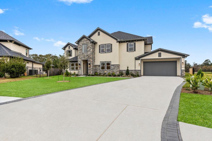 Front exterior of a new home in , Spring, TX, highlighting curb appeal (Image 1). Front exterior of a new home in , Spring, TX, highlighting curb appeal (Image 1).