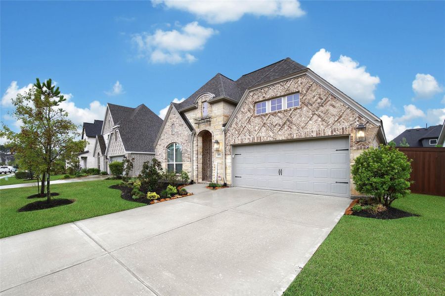Why wait for new construction upgrades? This home already has the extras in place, including 2" blinds, cabinet hardware, permanent remote-controlled outdoor lighting & full sprinklers. Need more storage? Almost 200 SF of floored attic space provides valuable room to store everything from holiday décor to household extras.