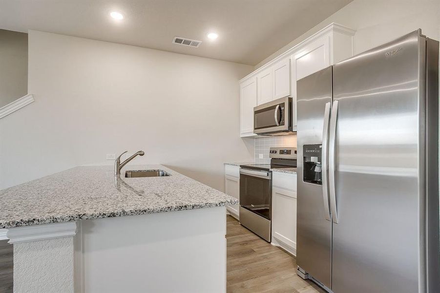 Furnished interior view inside a new home in , Mansfield (Image 6).
