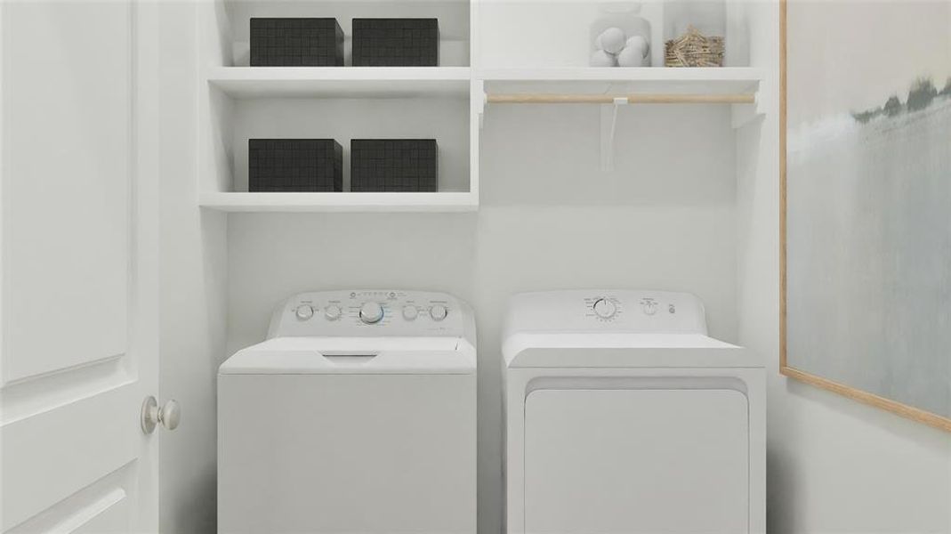 Laundry room featuring washing machine and clothes dryer Laundry room featuring washing machine and clothes dryer