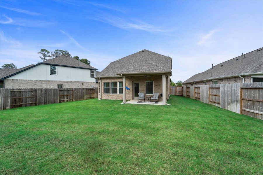 Exterior details and patio area of a home in Sorella, Tomball (Image 25).