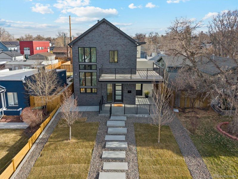 Front exterior of a new home in , Denver, CO, highlighting curb appeal (Image 28).