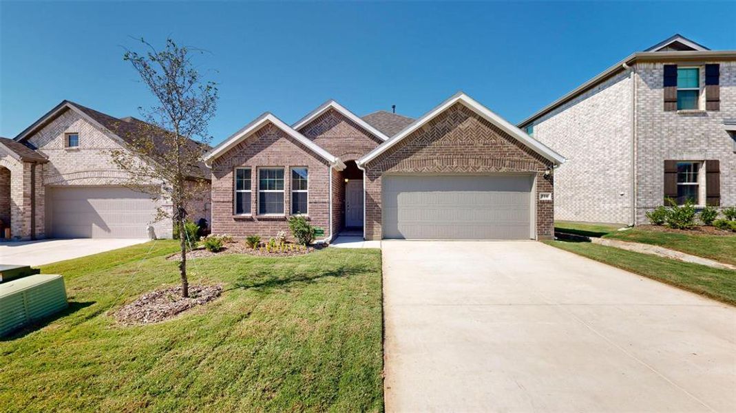 Front exterior of a new home in Forest Park, Princeton, TX, highlighting curb appeal (Image 2).