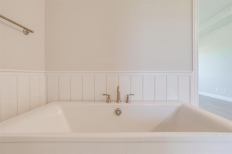 Bathroom with hardwood / wood-style floors