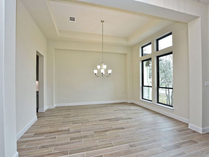 Representative unfurnished interior of a home built from the Avalon by Giddens Homes in Scofield Farms Estates, Georgetown (Image 151).