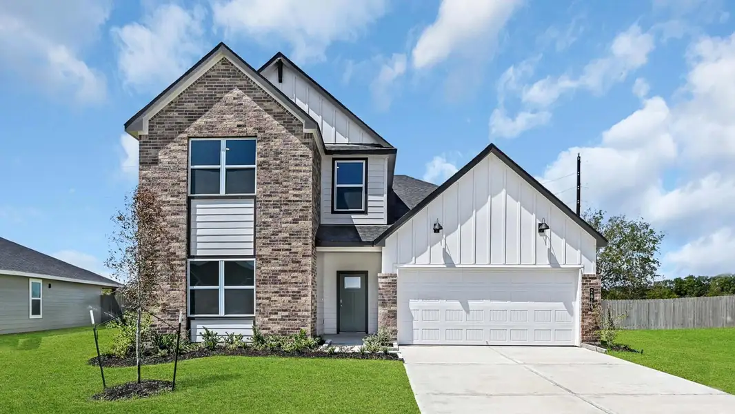 Front exterior of a new home in Holly Ridge, Rosenberg, TX, highlighting curb appeal (Image 1). Front exterior of a new home in Holly Ridge, Rosenberg, TX, highlighting curb appeal (Image 1).