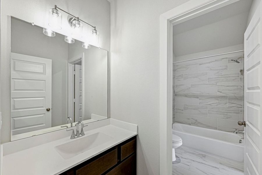 Furnished interior view inside a new home in Santa Rita Ranch - 60', Liberty Hill (Image 12). Furnished interior view inside a new home in Santa Rita Ranch - 60', Liberty Hill (Image 12).