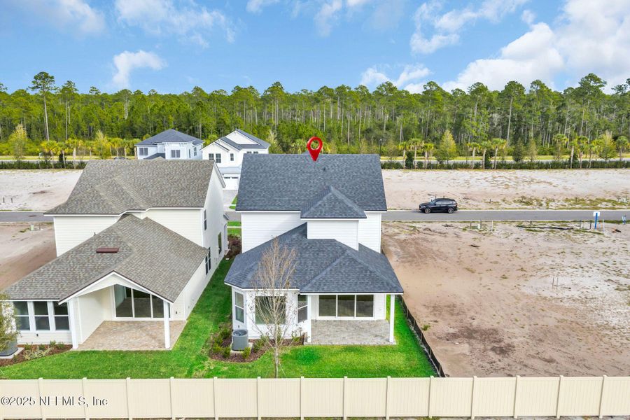 Front exterior of a new home in Seabrook Village at Seabrook, Ponte Vedra, FL, highlighting curb appeal (Image 29).