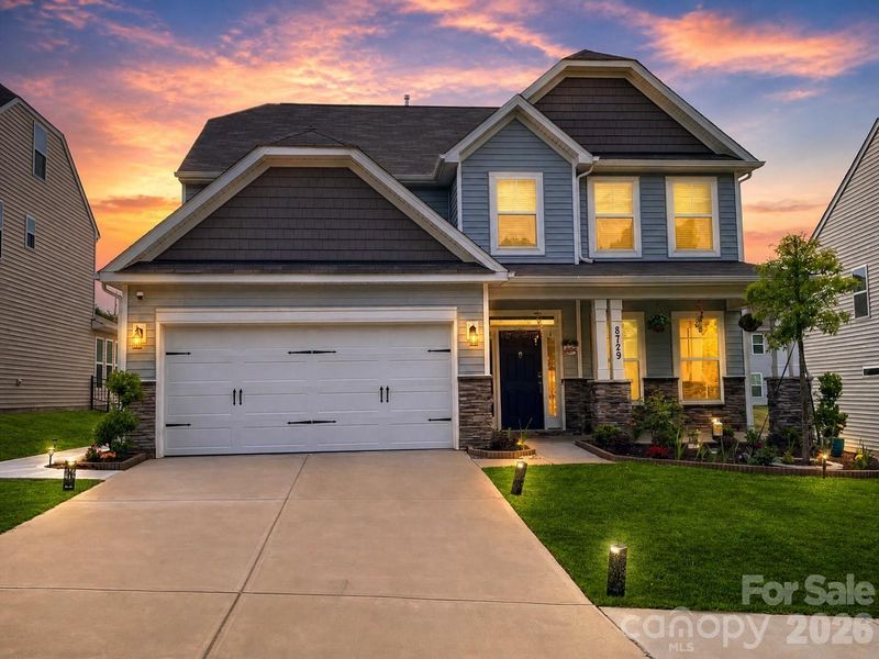 Front exterior of a new home in , Charlotte, NC, highlighting curb appeal (Image 23). Front exterior of a new home in , Charlotte, NC, highlighting curb appeal (Image 23).