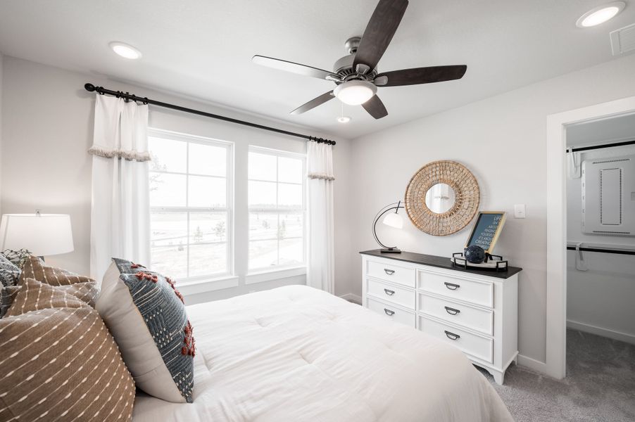 Representative furnished interior of a home built from the Yellowstar by Tri Pointe Homes in Mason Woods, Cypress (Image 18).