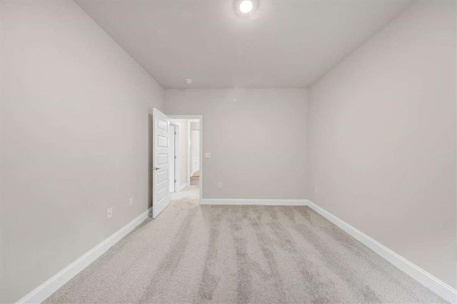 Spacious, unfurnished interior of a new home in Scarlett Place, Bowdon (Image 28).
