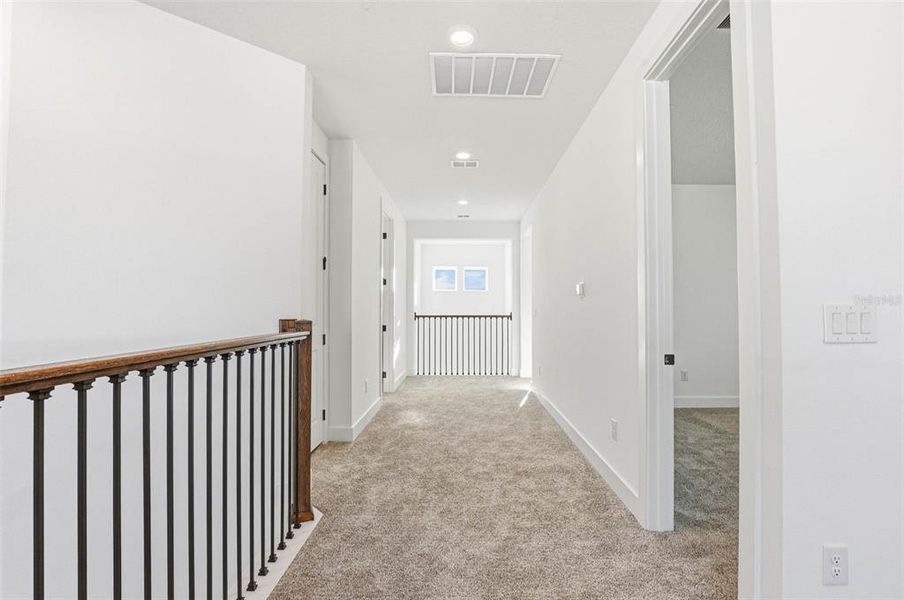 Spacious, unfurnished interior of a new home in Vida's Way, Wesley Chapel (Image 62).