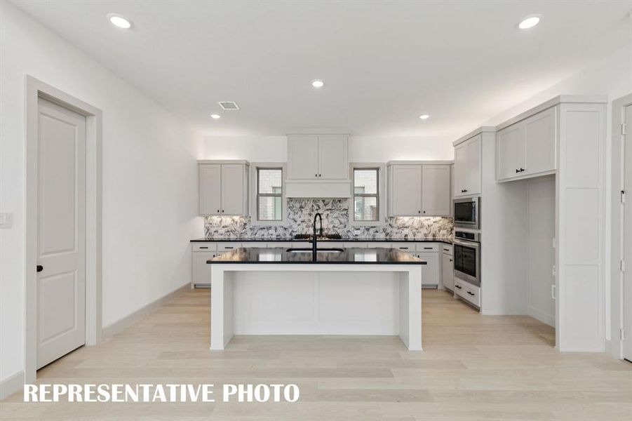 Beautiful flooring, outstanding cabinetry, striking countertops and modern stainless steel come together to form this dream kitchen! REPRESENTATIVE PHOTO Beautiful flooring, outstanding cabinetry, striking countertops and modern stainless steel come together to form this dream kitchen! REPRESENTATIVE PHOTO