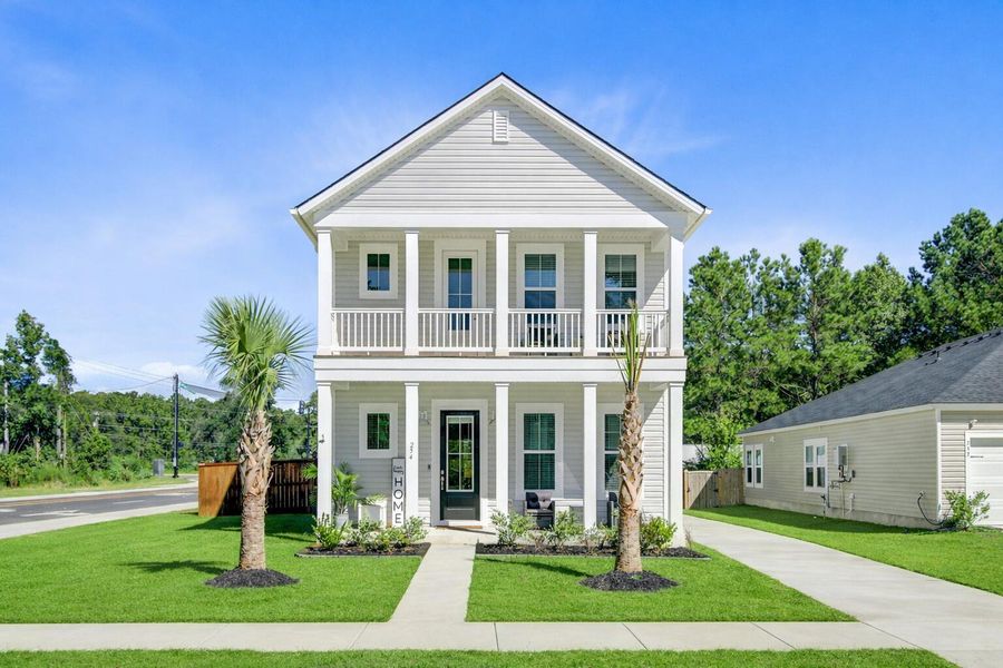 Front exterior of a new home in Limehouse Village: Row Collection, Summerville, SC, highlighting curb appeal (Image 26).