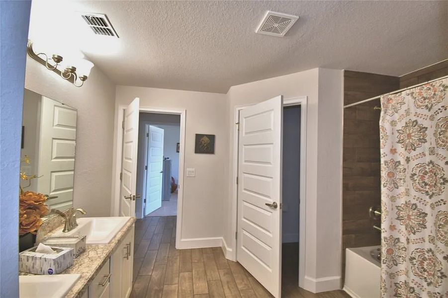 Furnished interior view inside a new home in Magnolia Park, Haines City (Image 18).
