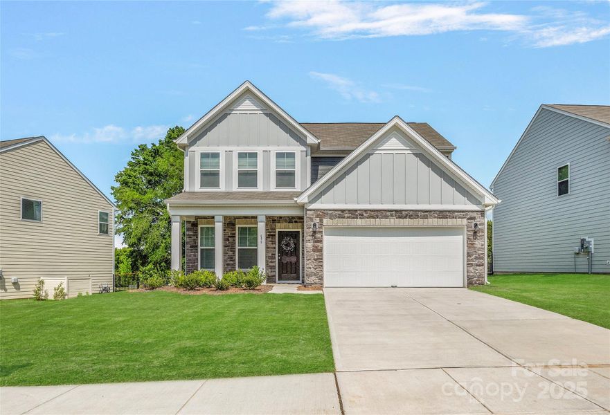 Front exterior of a new home in Piper Landing, Concord, NC, highlighting curb appeal (Image 18).