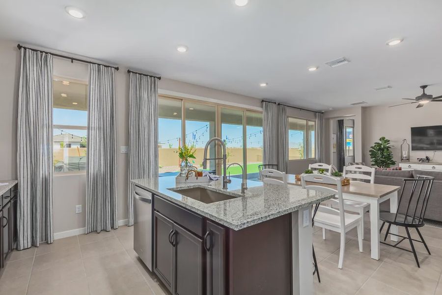 Representative furnished interior of a home built from the 1603 by Elliott Homes in Acacia at Santana, Yuma (Image 12).