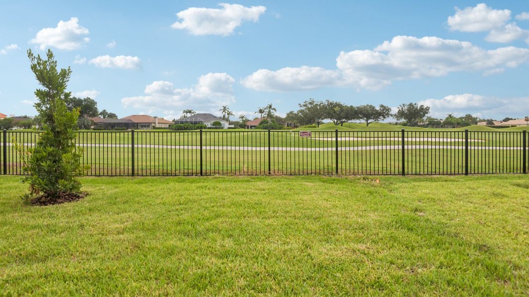Exterior details and patio area of a home in Grasslands West, Lakeland (Image 22).