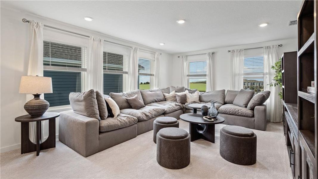 Furnished interior view inside a new home in Wellness Ridge, Clermont (Image 6).