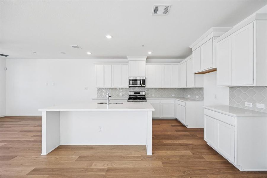 No shortage of space or style in this dream kitchen!