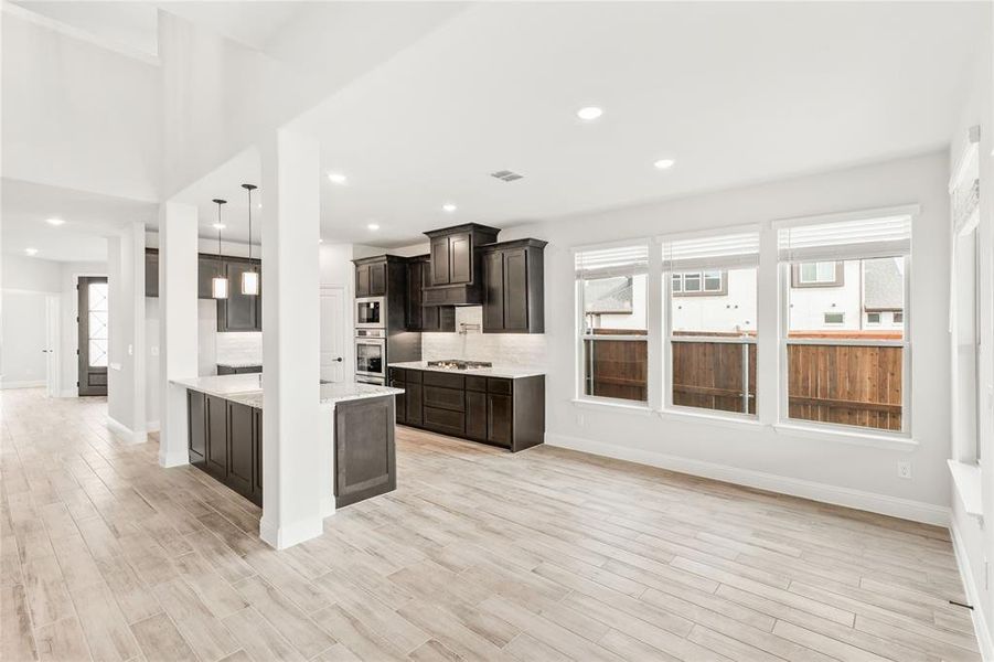 Furnished interior view inside a new home in Stone River Glen 60s, Royse City (Image 9).