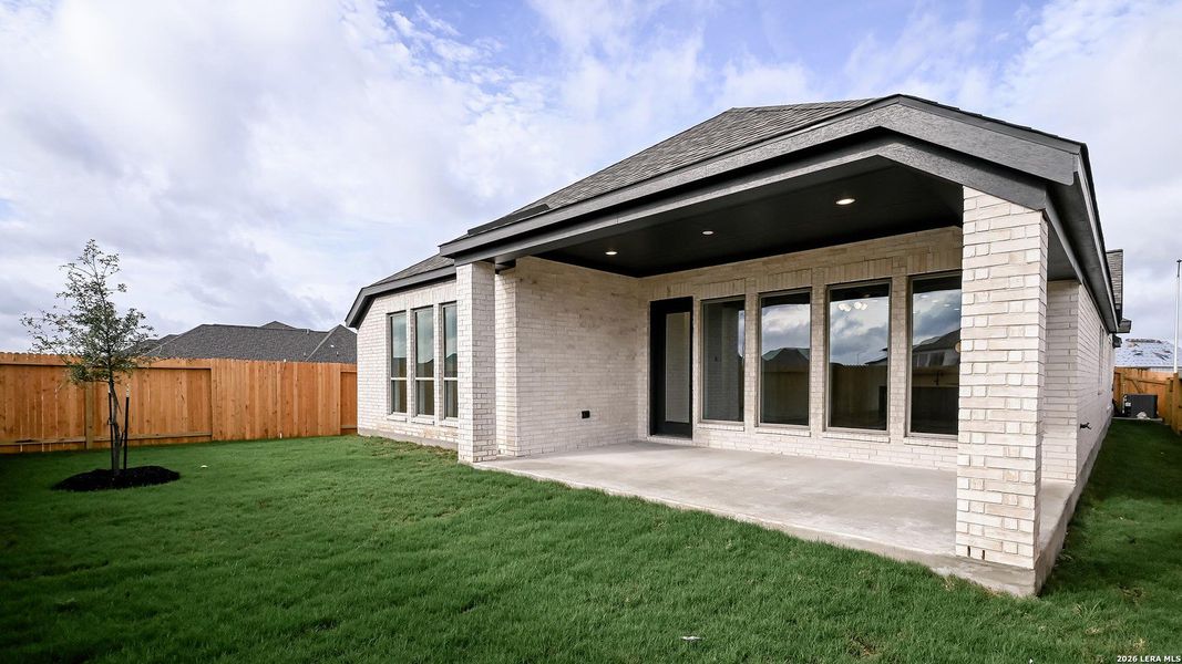 Exterior details and patio area of a home in Meadows of Mill Creek, Seguin (Image 22).