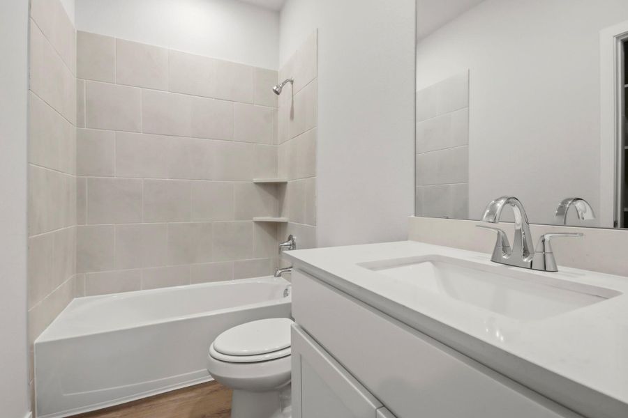 Furnished interior view inside a new home in Granger Pines, Conroe (Image 3).