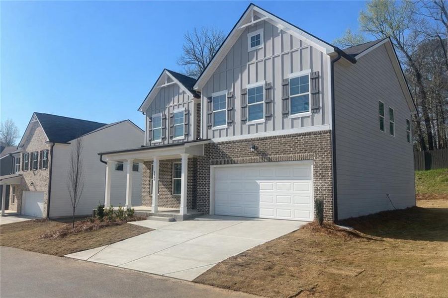 Front exterior of a new home in Stonegate, Atlanta, GA, highlighting curb appeal (Image 16).