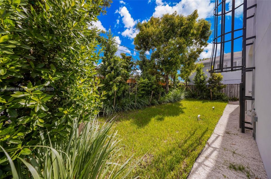 Front exterior of a new home in , Miami, FL, highlighting curb appeal (Image 12).