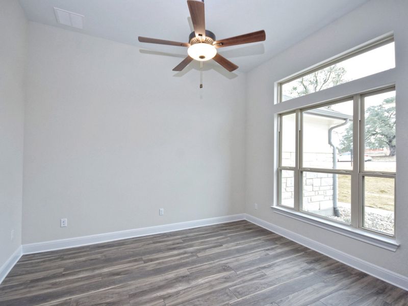 Representative unfurnished interior of a home built from the San Simeon I by Giddens Homes in Clearwater Ranch, Liberty Hill (Image 25).