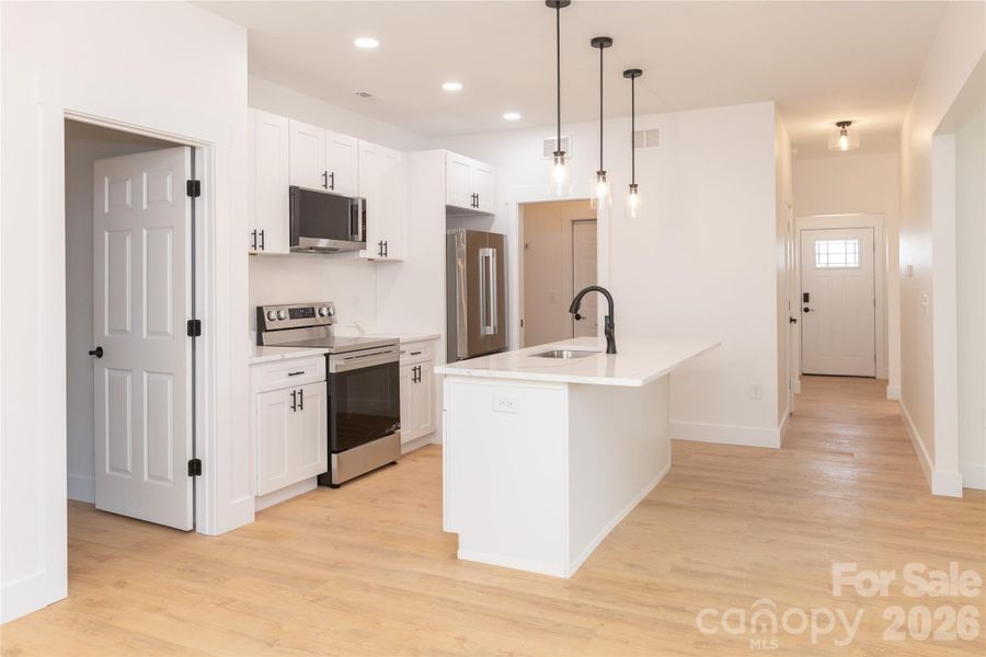 Furnished interior view inside a new home in , Concord (Image 13).