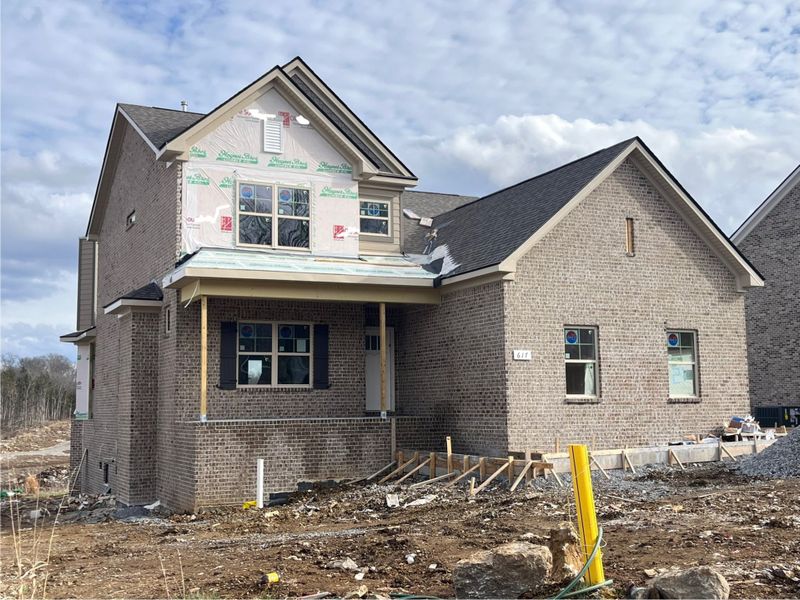 Waiting on second floor stone which is a brown and beige blend. It's going to be so good looking!