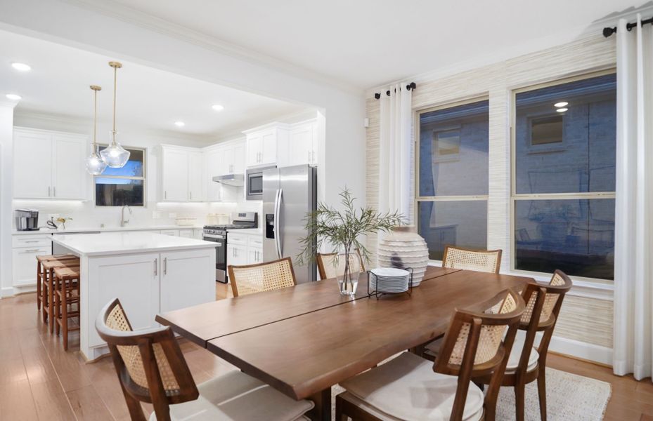 Representative furnished interior of a home built from the Flagstone by DiVosta in BeachWalk by Manasota Key, Englewood (Image 7).