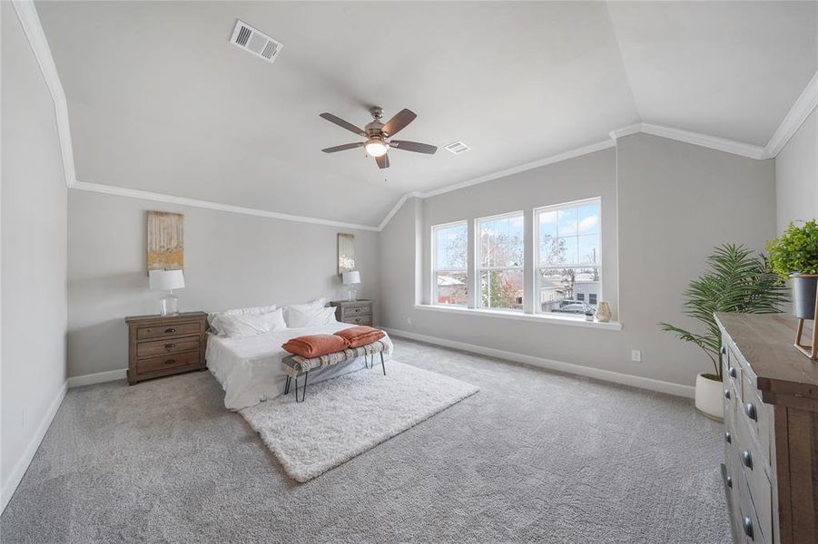 Ascend to the Primary Bedroom where ceilings reach skyward, creating a spacious sanctuary above the city's buzz. (Sample photos of a completed Bordeaux floor plan. The image may feature alternative selections and/or upgrades.)