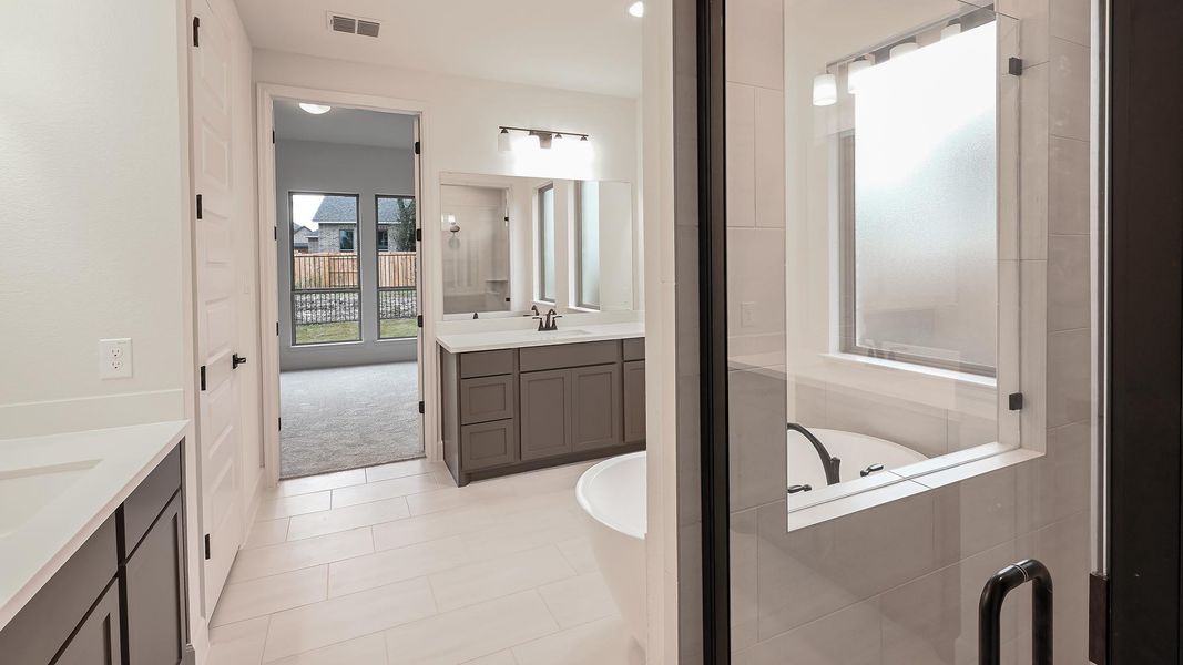 Furnished interior view inside a new home in 6 Creeks, Kyle (Image 11).