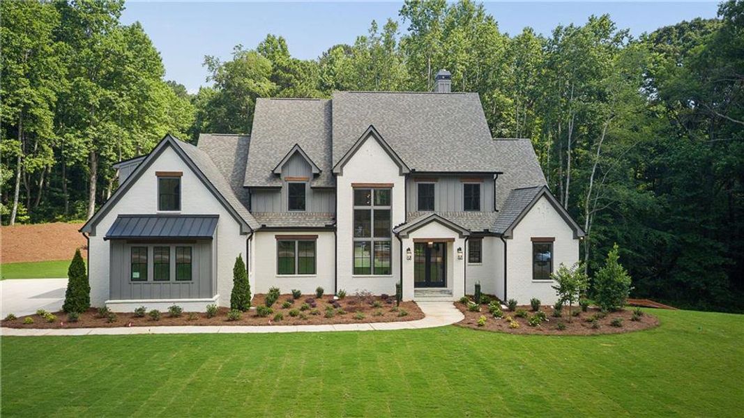 Front exterior of a new home in , Canton, GA, highlighting curb appeal (Image 2). Front exterior of a new home in , Canton, GA, highlighting curb appeal (Image 2).