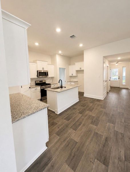 Furnished interior view inside a new home in River Ranch Trails, Dayton (Image 8).