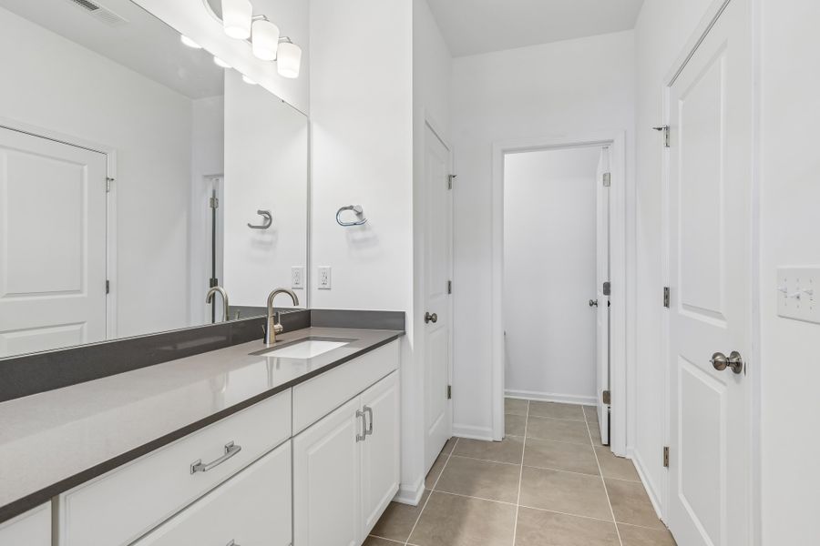 Furnished interior view inside a new home in Terraces at the Exchange, Indian Land (Image 8).