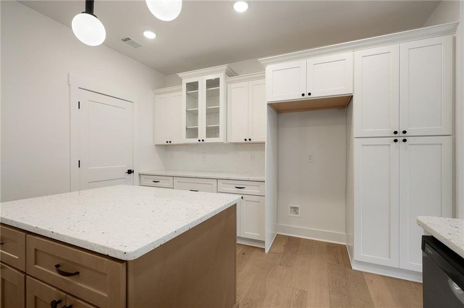 Furnished interior view inside a new home in , White (Image 13).