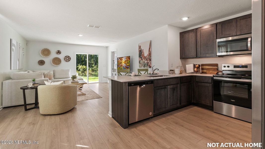 Furnished interior view inside a new home in Rookery, Green Cove Springs (Image 22).