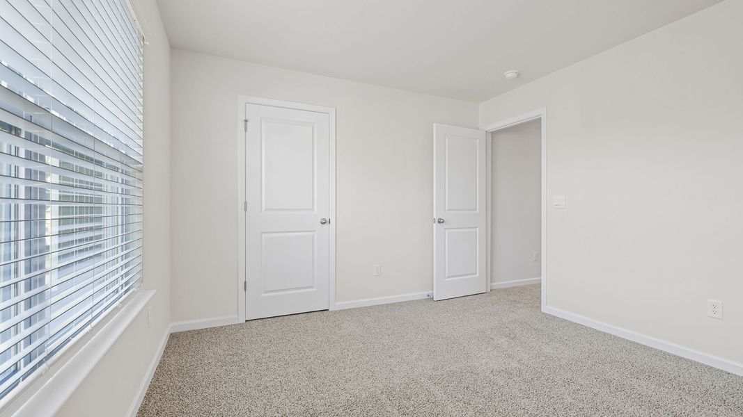 Spacious, unfurnished interior of a new home in Bentley Park, Greenwood (Image 27). Spacious, unfurnished interior of a new home in Bentley Park, Greenwood (Image 27).