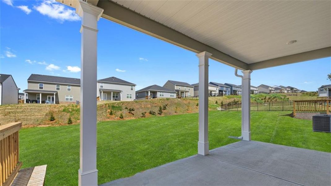 Exterior details and patio area of a home in Twin Lakes, Hoschton (Image 3).