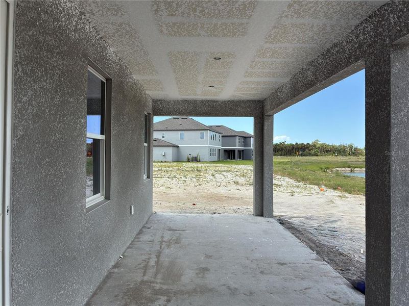 Exterior details and patio area of a home in Oakfield Trails, Parrish (Image 3).