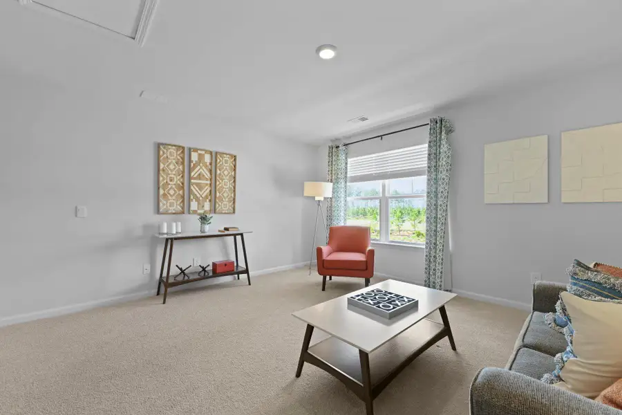 Furnished interior view inside a new home in Pine Hills at Cane Bay, Moncks Corner (Image 5).